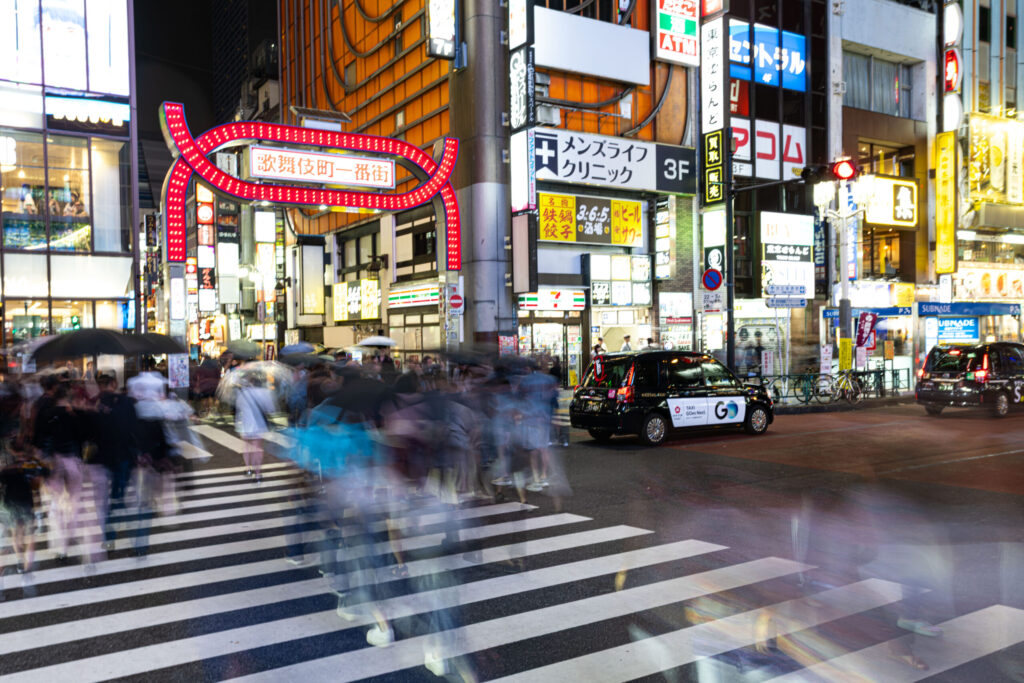 Pedestrians crossing Yasukuni-dori Street become ghosts